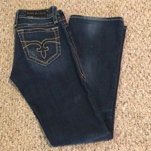 Almost New Distressed Rock Revival Boot cut Jeans
